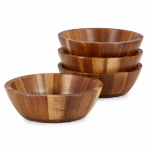 A premium 4-piece wooden soup and salad bowl set arranged neatly on a modern white kitchen counter.